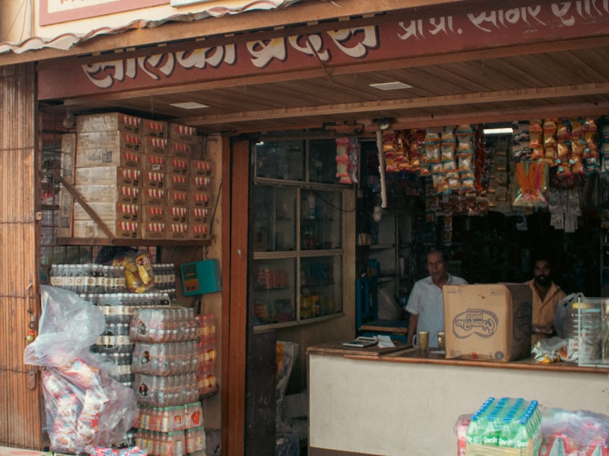 A neighbourhood kirana shop successful India pinch packaged equipment stacked outside